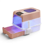 Bac à litière Esprit Chat fermé en plastique rose et blanc avec tiroir coulissant et porte basculante bleue