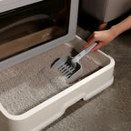 Bac à litière pliable pour chat Esprit Chat en plastique gris et blanc avec tiroir de rangement et pelle.