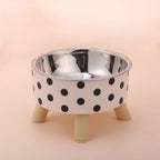 Bol pour chat Esprit Chat en acier inoxydable avec motif à pois noirs sur fond blanc et pieds en bois clair