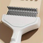 Brosse de toilettage Esprit Chat en acier inoxydable pour chat à poils longs avec manche ergonomique blanc
