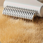 Brosse Esprit Chat en acier inoxydable pour démêler efficacement les poils longs des animaux
