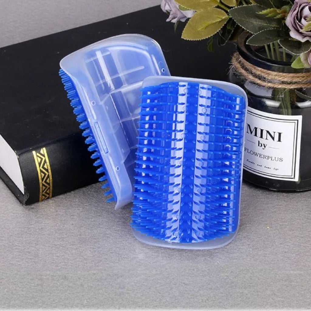 Brosse de massage Esprit Chat bleue en plastique pour chat, conçue pour être fixée aux coins des murs ou des meubles.
