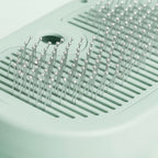 Brosse vapeur Esprit Chat en plastique vert menthe avec picots arrondis pour le toilettage et massage des animaux