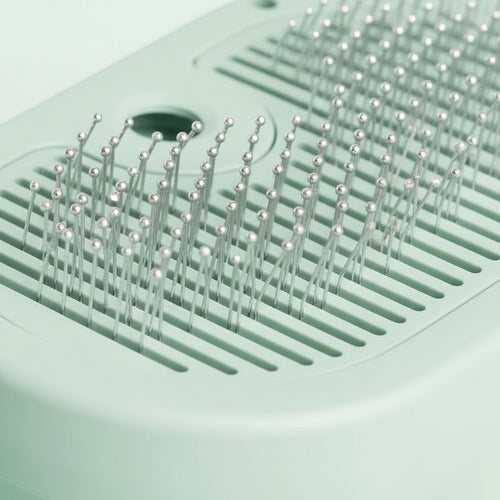 Brosse vapeur Esprit Chat en plastique vert menthe avec picots arrondis pour le toilettage et massage des animaux