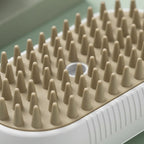 Brosse Esprit Chat électrique avec picots en silicone souple pour le toilettage et le massage des poils d'animaux