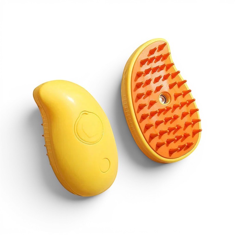 Brosse vapeur Esprit Chat jaune et orange pour le toilettage des poils de chat avec picots en silicone souple