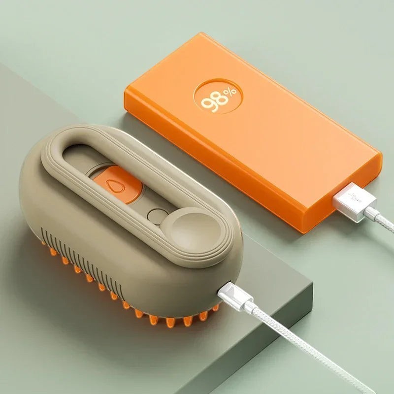 Brosse de toilettage Esprit Chat rechargeable avec fonction vapeur pour chat et chien, couleur beige et orange