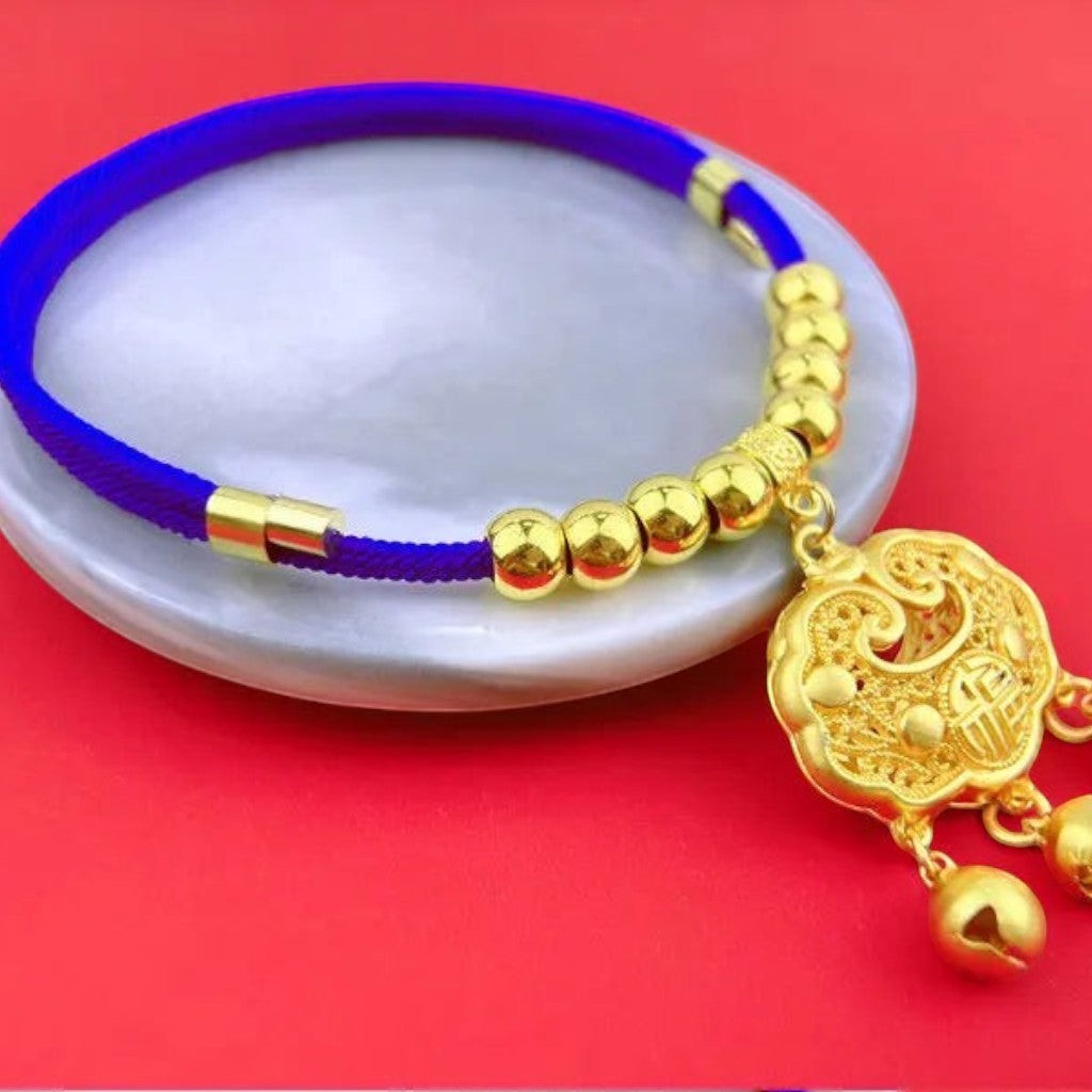 Collier pour chat Esprit Chat en corde bleue avec perles dorées et pendentif traditionnel en métal doré à clochettes