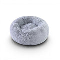 Coussin rond gris en fausse fourrure pour chat, doux et confortable, lavable en machine, par Esprit Chat.