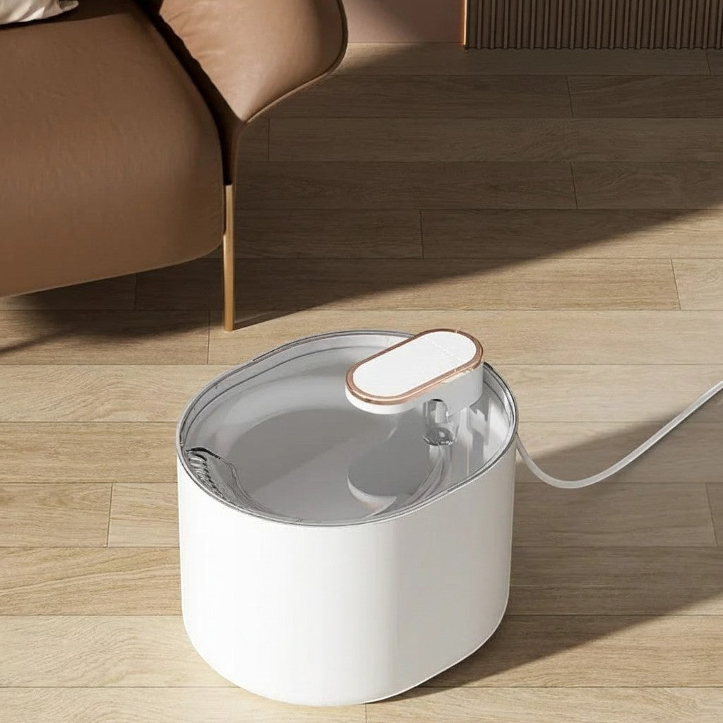 Fontaine à eau pour animaux domestiques Esprit Chat, blanche et transparente, en plastique, avec une capacité de 3L et un design moderne.