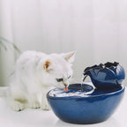 Fontaine à eau en céramique bleue Esprit Chat pour chats, avec filtre et fonctionnement silencieux.
