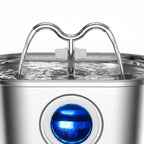 Fontaine à eau pour chat Esprit Chat en acier inoxydable argenté avec bec verseur LED bleu.