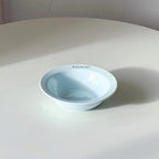 Gamelle pour chat Esprit Chat en céramique bleu clair arrondie avec inscription A.CUTE PET, design moderne et épuré