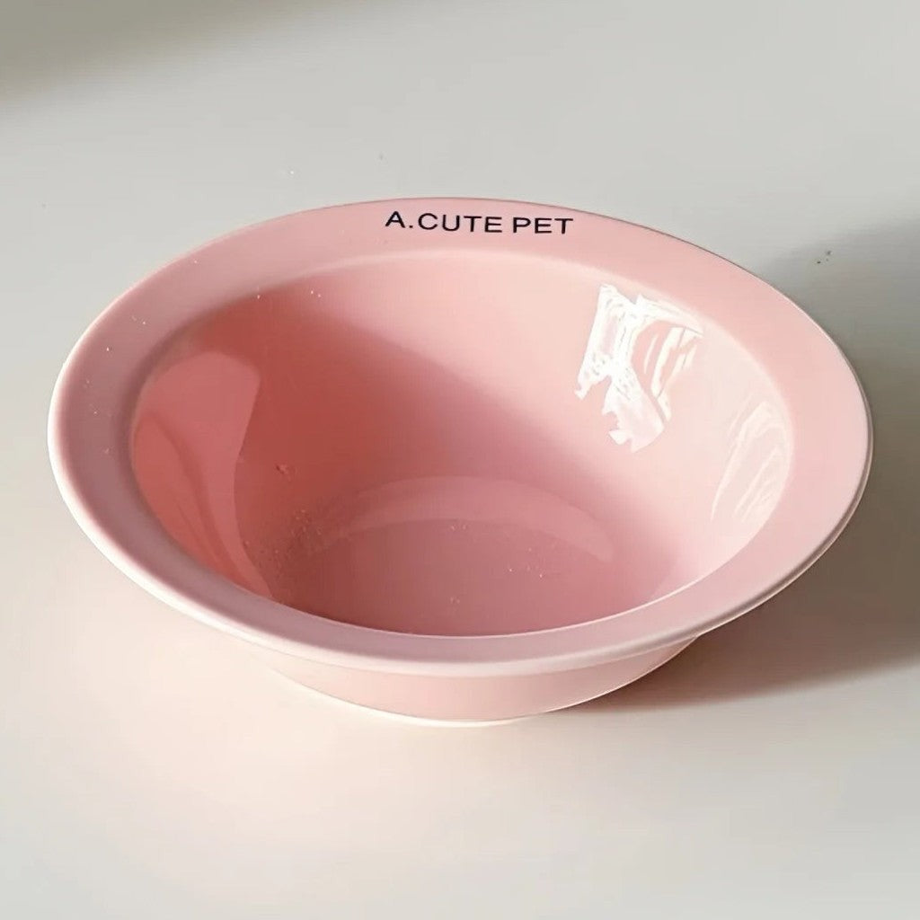 Gamelle pour chat Esprit Chat en céramique rose de forme arrondie avec inscription A.CUTE PET, design moderne
