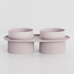 Gamelle double Esprit Chat rose en céramique sur support surélevé pour chat, design moderne et ergonomique