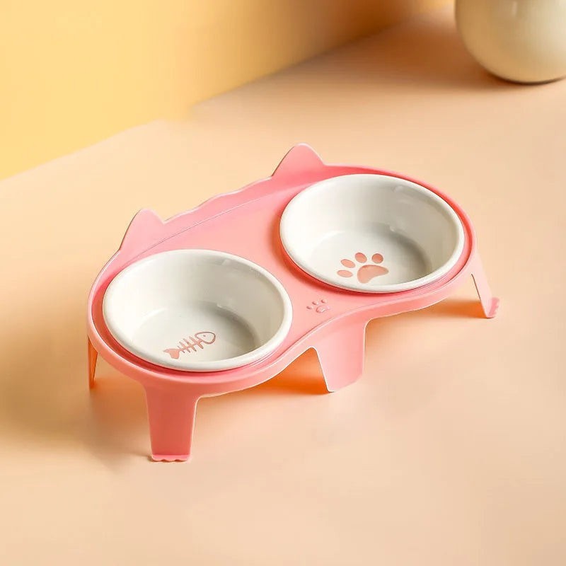 Gamelle double Esprit Chat en céramique rose avec motifs de patte et d'arête de poisson pour chat
