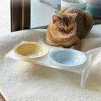 Gamelle double Esprit Chat en céramique avec supports surélevés transparents, bols pastel jaune et bleu pour chat