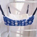 Hamac Esprit Chat bleu à motifs de chats avec intérieur en fibre douce et respirante, suspendu dans une cage