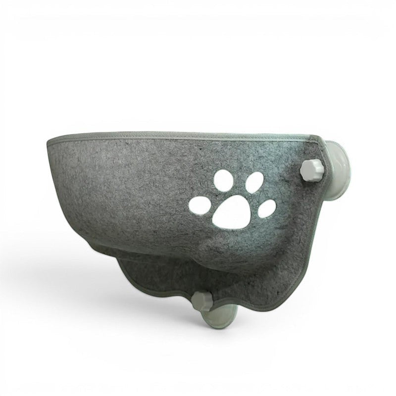 Hamac de balcon pour chat Esprit Chat en feutre gris avec découpe en forme de patte et ventouses de fixation