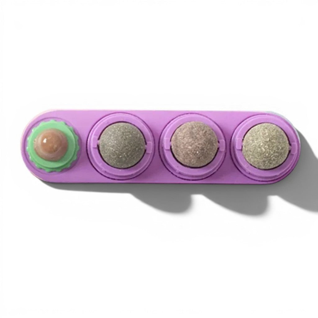 Jouet Esprit Chat rotatif avec boules d'herbe à chat pour le nettoyage des dents et le divertissement félin.
