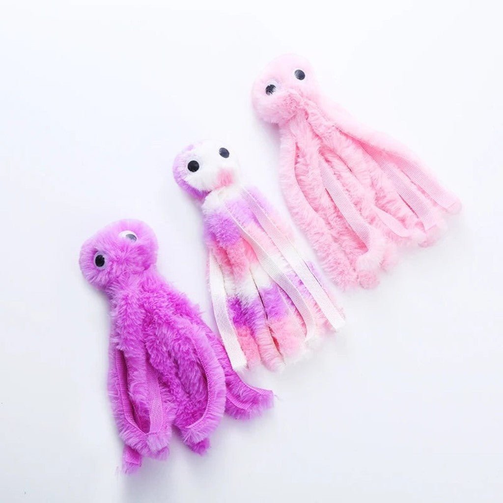 Trois jouets en peluche en forme de poulpe pour chat Esprit Chat, en tissu doux rose et violet avec des tentacules.