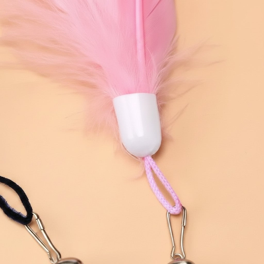 Jouet plume rose pour chat Esprit Chat avec attache métallique, idéal pour stimuler l'instinct de chasse