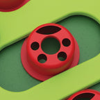 Jouet puzzle Esprit Chat en plastique vert et rouge avec compartiments coulissants pour stimuler l'instinct du chat