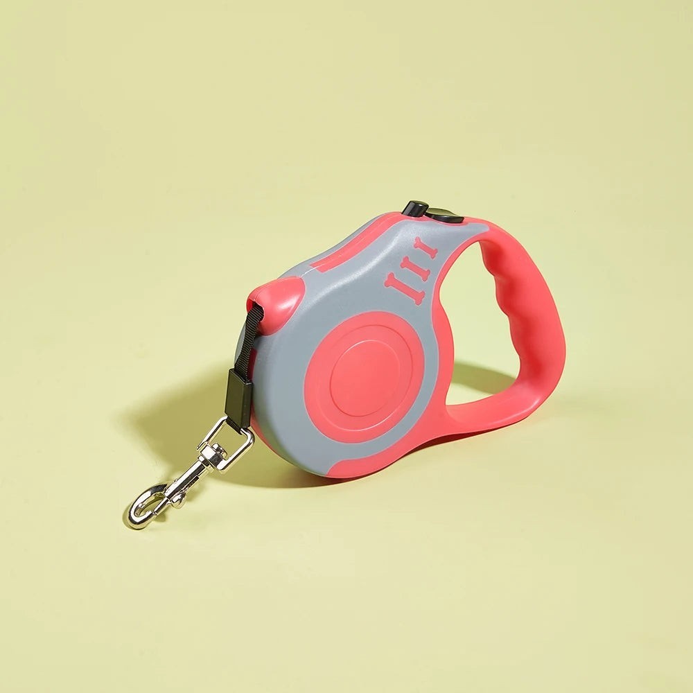 Laisse rétractable Esprit Chat de 5m en plastique rose et gris avec poignée ergonomique et mousqueton métallique