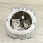 Maison pour chat Esprit Chat en coton gris en forme de tête de chat avec un jouet suspendu pour le confort