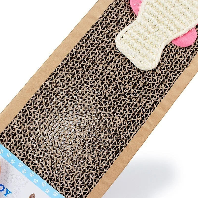Planche griffoir pour chat Esprit Chat en carton ondulé avec jouet en corde et détails roses.