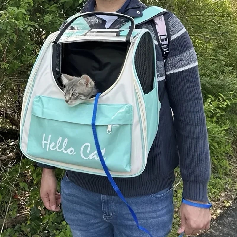 Sac à dos de transport Esprit Chat bleu et blanc avec fenêtre transparente pour chat, porté par une personne.