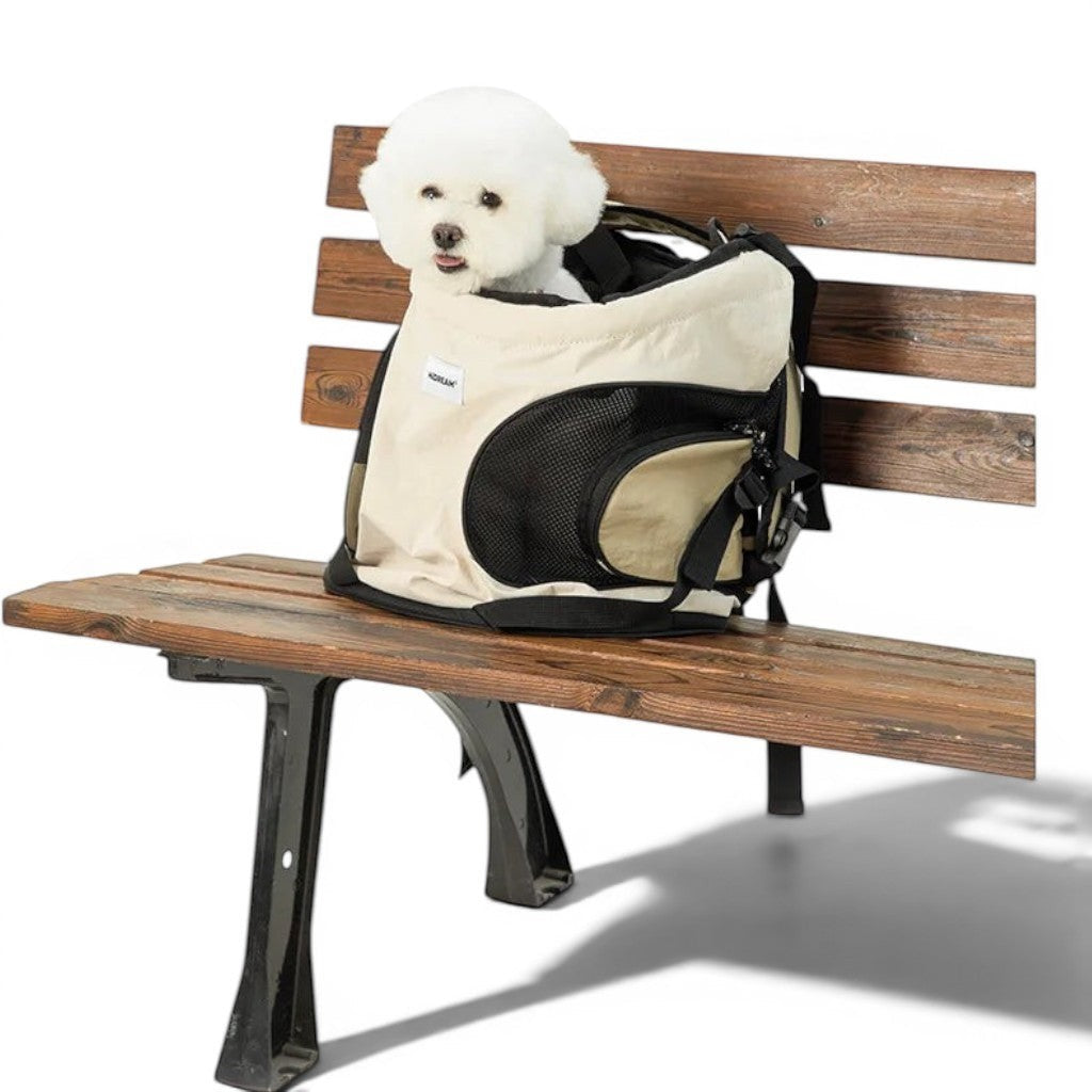 Sac de transport pliable Esprit Chat en nylon beige avec filet noir pour chien sur un banc en bois