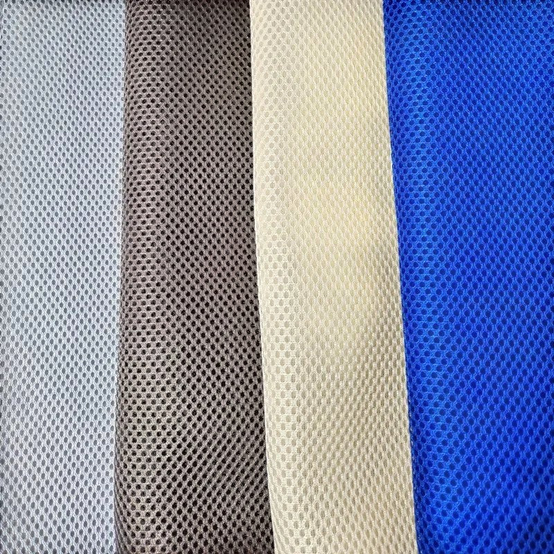Gros plan sur les textures en maille respirante Esprit Chat pour hamac de cage, disponibles en quatre coloris