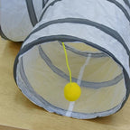Tunnel de jeu Esprit Chat blanc en polyester avec balle jaune suspendue pour stimuler l'activité de votre félin