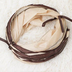 Tunnel de jeu pliable Esprit Chat en polyester beige et marron pour chat, idéal pour l'exercice et le divertissement.