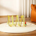Tunnel de jeu pliable en nylon jaune avec plumes pour chat Esprit Chat sur un tapis rond